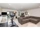 Finished basement offers a cozy lounge area with a walkout, gym, and space for recreation at 1154 Romeria Dr, Durham, NC 27713