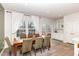 Cozy dining area with large windows and elegant furniture at 1154 Romeria Dr, Durham, NC 27713