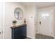 Bright entryway featuring a stylish console table and modern decor at 1154 Romeria Dr, Durham, NC 27713