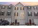 Charming townhome featuring a well-maintained facade and inviting curb appeal at 1154 Romeria Dr, Durham, NC 27713