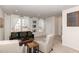 A welcoming living room featuring large windows with natural light and stylish decor at 1154 Romeria Dr, Durham, NC 27713