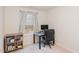 Bright office space with a desk, ergonomic chair, and shelving, perfect for productivity at 1154 Romeria Dr, Durham, NC 27713
