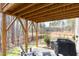 This outdoor patio with a view of the woods is ideal for enjoying the peaceful scenery and grilling at 1154 Romeria Dr, Durham, NC 27713