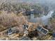 Aerial view of home overlooking lake at 118 N Drawbridge Ln, Cary, NC 27513