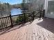 Back deck overlooking a peaceful pond with a fountain at 118 N Drawbridge Ln, Cary, NC 27513
