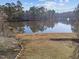Backyard view of lake at 118 N Drawbridge Ln, Cary, NC 27513