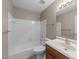 Full bathroom with a shower-tub combo, single sink vanity, and tile floors at 118 N Drawbridge Ln, Cary, NC 27513