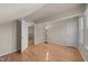 Spacious bedroom with hardwood floors, and white doors at 118 N Drawbridge Ln, Cary, NC 27513