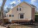 Rear exterior featuring a patio and a sunroom at 118 N Drawbridge Ln, Cary, NC 27513