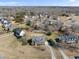 Expansive aerial view of a residential neighborhood showing homes with mature trees, and established yards at 126 Claire Dr, Clayton, NC 27520