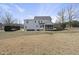 Back exterior of home with large backyard at 126 Claire Dr, Clayton, NC 27520