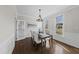 Bright dining room featuring classic decor and wainscoting details at 126 Claire Dr, Clayton, NC 27520