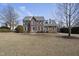 Two-story brick home with large front lawn at 126 Claire Dr, Clayton, NC 27520