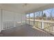 Screened-in porch with wood floors overlooking back yard at 126 Claire Dr, Clayton, NC 27520
