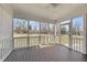Screened-in porch with wood floors and access to back yard at 126 Claire Dr, Clayton, NC 27520