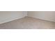 Finished basement with neutral carpet and paint, awaiting your personal touch at 1324 Vanagrif Ct, Wake Forest, NC 27587