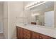Bathroom with double sink vanity, large mirror, and separate shower and toilet at 1324 Vanagrif Ct, Wake Forest, NC 27587