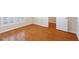 Bedroom featuring hardwood floors, window with blinds and a closet at 1324 Vanagrif Ct, Wake Forest, NC 27587