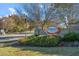 Elegant community entrance sign for Heritage Wake Forest, set among landscaped greenery and seasonal flowers at 1324 Vanagrif Ct, Wake Forest, NC 27587