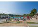 Community pool featuring ample seating, shaded areas, and a relaxing atmosphere at 1324 Vanagrif Ct, Wake Forest, NC 27587
