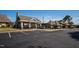 Community clubhouse area showcasing covered seating, exterior lighting, and parking at 1324 Vanagrif Ct, Wake Forest, NC 27587