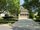 Charming two-story brick home with well-manicured lawn and inviting curb appeal at 1324 Vanagrif Ct, Wake Forest, NC 27587