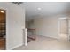 Bright hallway with carpet and staircase, plus a view to other rooms at 1324 Vanagrif Ct, Wake Forest, NC 27587