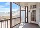 Cozy screened porch with wood flooring, perfect for outdoor relaxation at 1324 Vanagrif Ct, Wake Forest, NC 27587