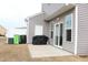 Outdoor patio space offering a great area for cooking and entertaining with vinyl siding and a white fence at 141 Rolesville Ridge Drive Dr, Rolesville, NC 27571