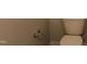 Toilet with chrome paper holder on the wall at 141 Rolesville Ridge Drive Dr, Rolesville, NC 27571