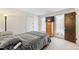 Bedroom featuring a large bed, dresser, and a lot of natural light at 145 Traceway N, Sanford, NC 27332