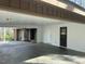 Spacious carport featuring a concrete floor and convenient access doors at 145 Traceway N, Sanford, NC 27332