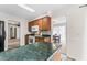Efficient kitchen layout with overhead cabinets and a view into the dining room at 145 Traceway N, Sanford, NC 27332