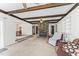 Spacious living area showcasing a stone fireplace and open access to the dining area at 145 Traceway N, Sanford, NC 27332