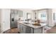 Spacious kitchen featuring stainless steel appliances, an island, and an open layout at 164 Ethel Ln, Angier, NC 27501