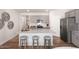Stylish kitchen with granite countertops, an island with seating, and modern appliances at 164 Ethel Ln, Angier, NC 27501