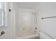 Clean bathroom featuring a shower and a window that provides natural lighting at 2004 Beecham Cir, Raleigh, NC 27607