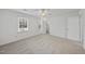 Spacious bedroom featuring a ceiling fan, neutral carpeting, and closet at 2004 Beecham Cir, Raleigh, NC 27607