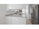 White kitchen featuring updated appliances and ample counter space at 2004 Beecham Cir, Raleigh, NC 27607