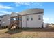 Home exterior with a screened porch and spacious backyard at 201 Northview Dr, Middlesex, NC 27557