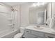 Bathroom with a tub and shower combo, toilet, and single sink vanity at 201 Northview Dr, Middlesex, NC 27557