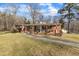 Charming single-story brick home featuring a welcoming front porch and landscaped pathway at 217 Stephen Taylor Rd, Wake Forest, NC 27587