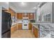 Functional kitchen with updated countertops, white appliances, and ample cabinet space at 217 Stephen Taylor Rd, Wake Forest, NC 27587