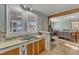 Kitchen with updated countertops and cabinetry flowing into the dining space at 217 Stephen Taylor Rd, Wake Forest, NC 27587