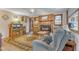 Living room with brick fireplace, decorative area rug, and a cozy seating arrangement at 217 Stephen Taylor Rd, Wake Forest, NC 27587