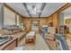 Inviting living space with wood paneling and cozy seating at 217 Stephen Taylor Rd, Wake Forest, NC 27587