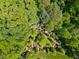 Overhead shot of the backyard highlighting the garden paths of this gorgeous landscaped yard at 219 Colvard Park Dr, Durham, NC 27713