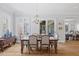 Bright dining area featuring a modern chandelier and comfortable seating for Gathering gatherings at 219 Colvard Park Dr, Durham, NC 27713