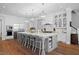 Gourmet eat-in kitchen with large island, seating, stainless appliances, and custom cabinets at 219 Colvard Park Dr, Durham, NC 27713