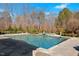 Beautiful backyard pool surrounded by lush landscaping and a serene atmosphere at 219 Colvard Park Dr, Durham, NC 27713